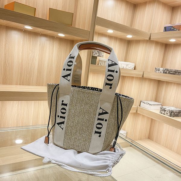 

luxury handbags the same woven women's 2021 new fashion summer korean version small fresh bucket portable shoulder bag