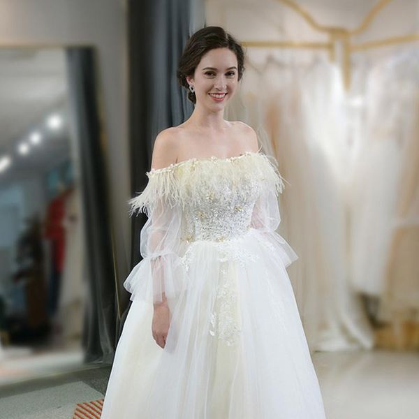 

elegant wedding dresses strapless long-sleeves applique race feather wedding dress custom made vestidos de novia, White