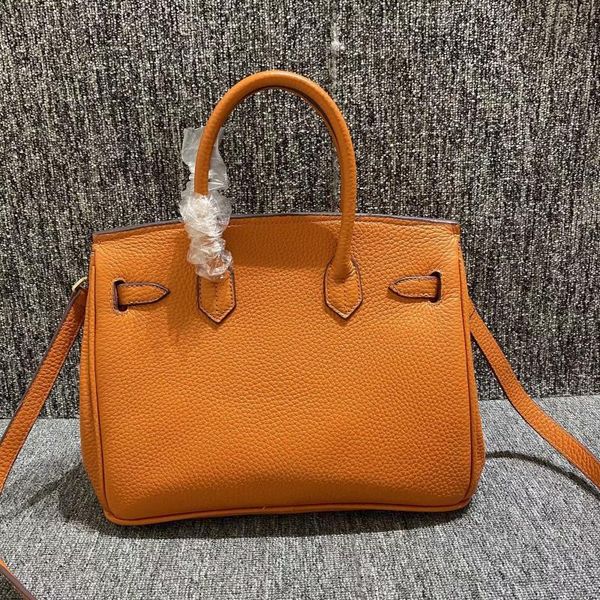

shopping mall off the shelf goods ~ women's korean version soft cow leather lock medium bag portable single shoulder pure