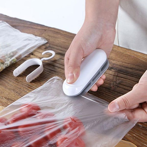 

small sealing machine mini plastic bag hand pressure heat vacuum preservation clips