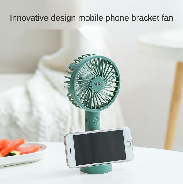 

electric fans mini portable fan handheld students small spray three-speed deskusb rechargeable outside mute moisturizing bracket