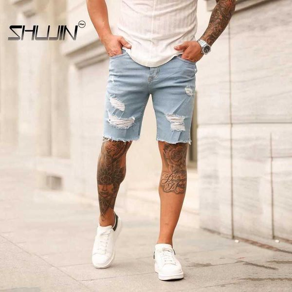 2021 Pantaloncini da uomo nuovi di zecca Jeans Pantaloni corti Jeans skinny distrutti Pantaloni strappati Denim sfilacciato taglia S-3XL X0705