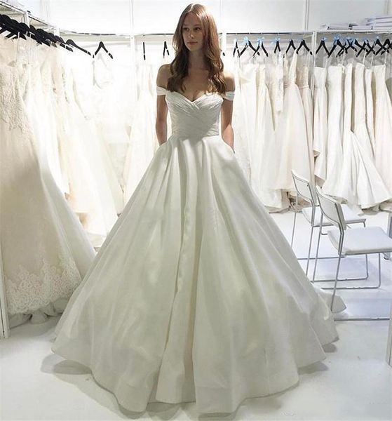 Abiti da sposa semplici in raso bianco A Line Abiti da sposa coreani lunghi con tasche Pieghe Sweep Train Scollo a V Cerniera posteriore Plus Size Abito da sposa 2021 robe de mari￩e