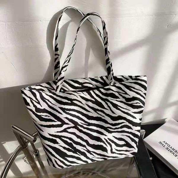 

duffel bags zebra printed canvas bag female tote 2021 campus student korean version ins large-capacity multifunctional all-matched