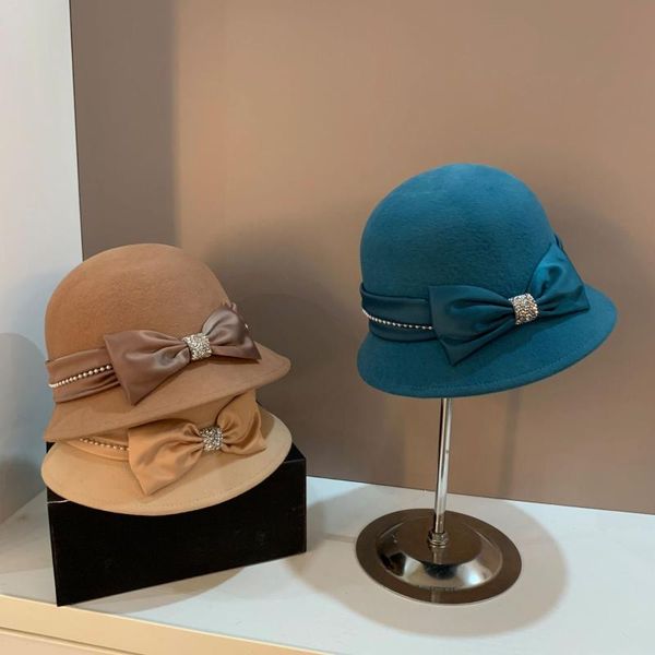 

wide brim hats korean version of rhinestone wild bow wool hat net red autumn and winter outdoor outing tide showing face small fisherma, Blue;gray