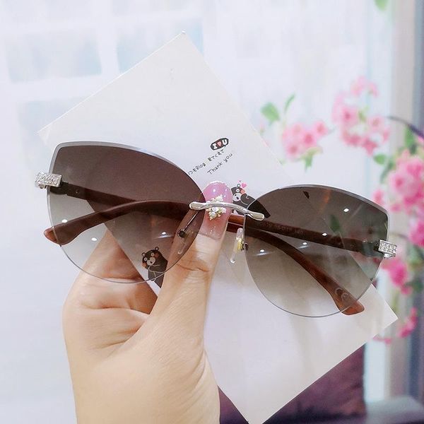 

sunglasses abay large cat eye women trimming elegant trendy fashion metal rimless eyewear female street shooting uv400 oculos, White;black