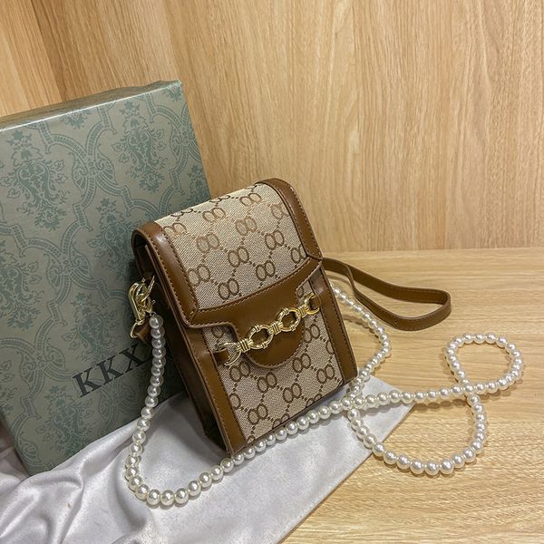 

70% off exclusive texture mobile phone bag new horseshoe button embroidered