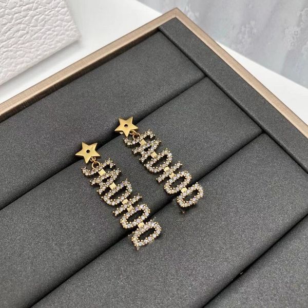 

70% off luxury jewelry home dijia 2021 new simple letter studded star stud brass material cw63, Golden