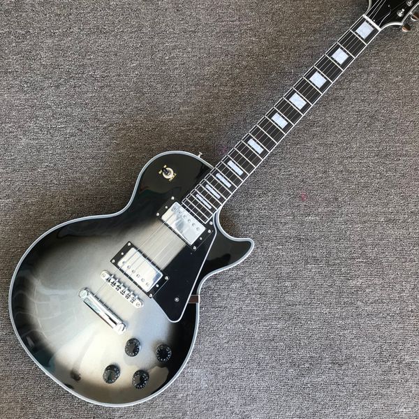 

electric guitar, rosewood fingerboard, silverburst color, chrome hardware,