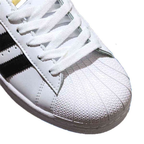 

putian shell head gold standard korean version men's wo board sho couple casual wo wear-ristant small