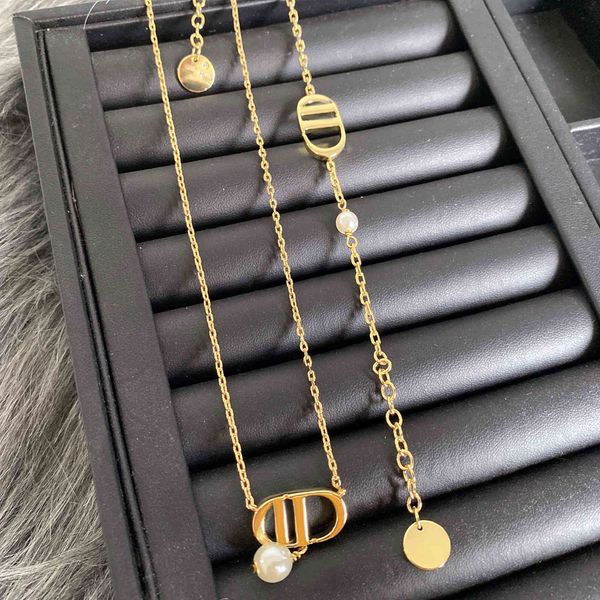 

family's 22-year-old letter necklace, Black