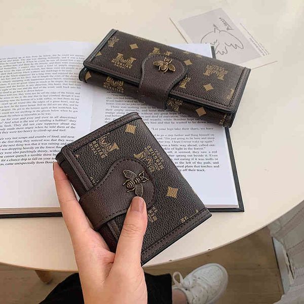 

2022 factory wholesale vintage printed small wallet women's short niche fashion simple multi card position long buckle handbag, Red;black