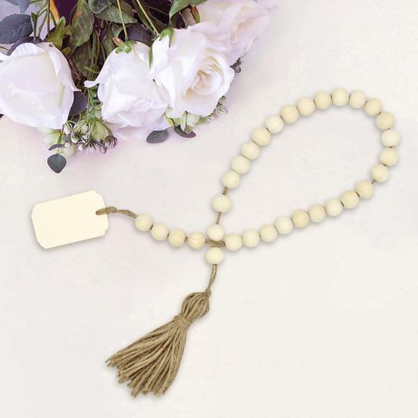 

wood bead garland with tassels and diy decorations farmhouse home beads neutral farmhouse vintage home country decor hanging