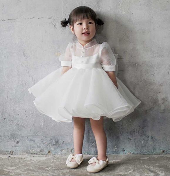 Abiti da ragazza 2022 Vestito da ragazza di fiore per bambini Semplice bianco di un anno per bambino Banchetto Compleanno Modello Passerella Abito da ballo per feste