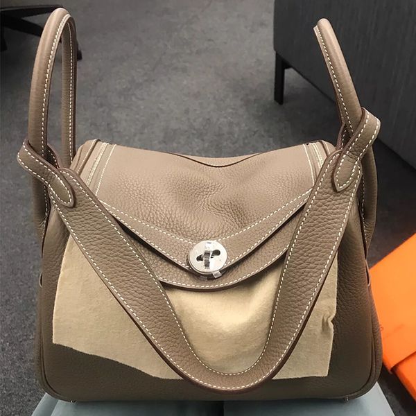 

wholesale fashion designer bag 2021 new layer cowhide litchi grain lindi doctor togo women's one shoulder handbag medicine