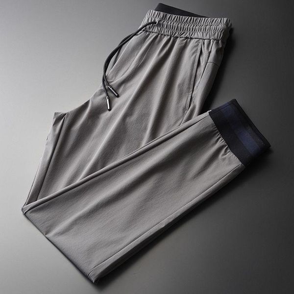 

men's pants 2021 summer casual capris slim cut out breathable silk slip hemmed in sports for men, Black