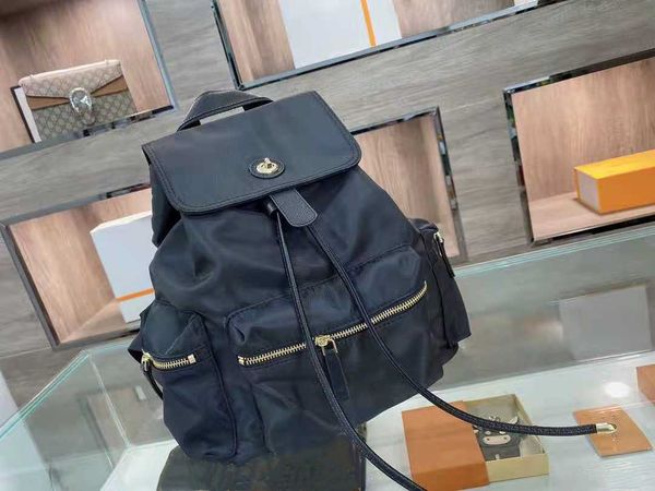 

leather handbags 2 size men and women school backpacks famous rivet printing backpack designer lady bags boy girl back pack1177