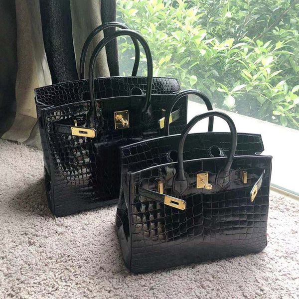 

macondolin 2020 new crocodile pattern headdress leather fashion hand women's bag