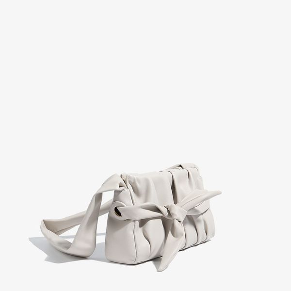 

2021 shoulder cowhide new fold style bag soft knot leather spring early simple tlsdi