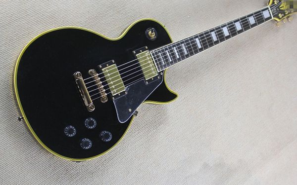 

black electric guitar yellow vintage wrap with black varnish