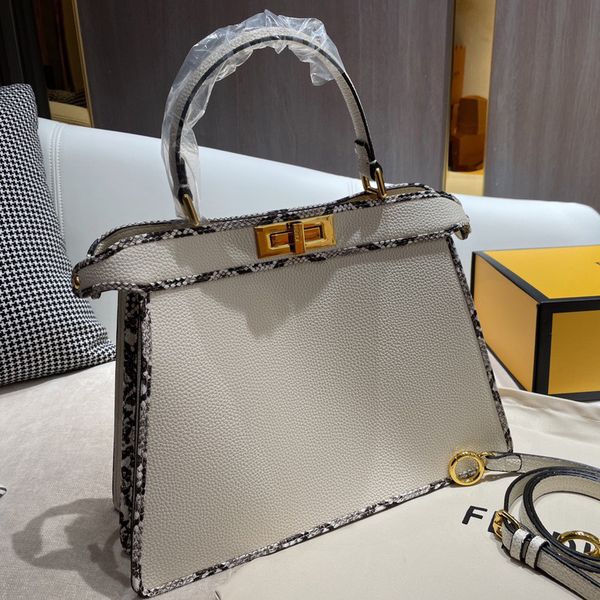 

design s new women's commuter professional style revolving buckle cowhide messenger single shoulder handbag