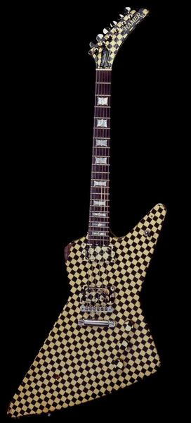 

custom guitar made of mahogany in black and white checker