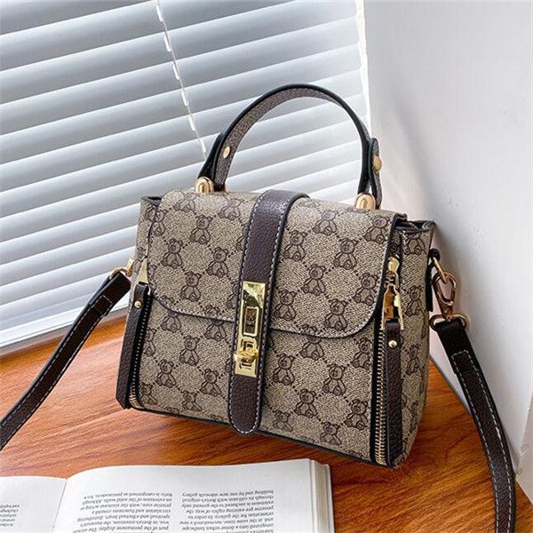 

factory wholesale brand women bag leathers shoulder handbag elegant atmosphere printing mother handbags double zipper contrast leather bucke, Black;red