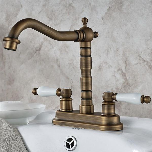 

antique brass 4" centerset bathroom two holes basin faucet sink mixer tap swivel spout double ceramic levers mnf427 faucets