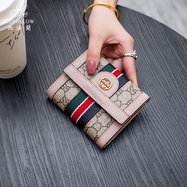 

new foldable wallet women's short leather fashion buckle three fold simple purse black friday, Red;black