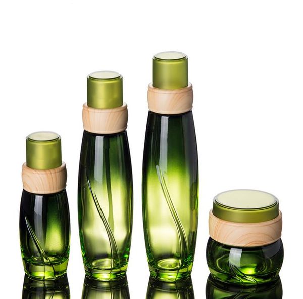 50 pz/lotto 40 ml 100 ml 120 ml bottiglia di vetro verde con pompa a pressione bottiglie di lozione coperchio a forma di legno per imballaggio cosmetico SN2669