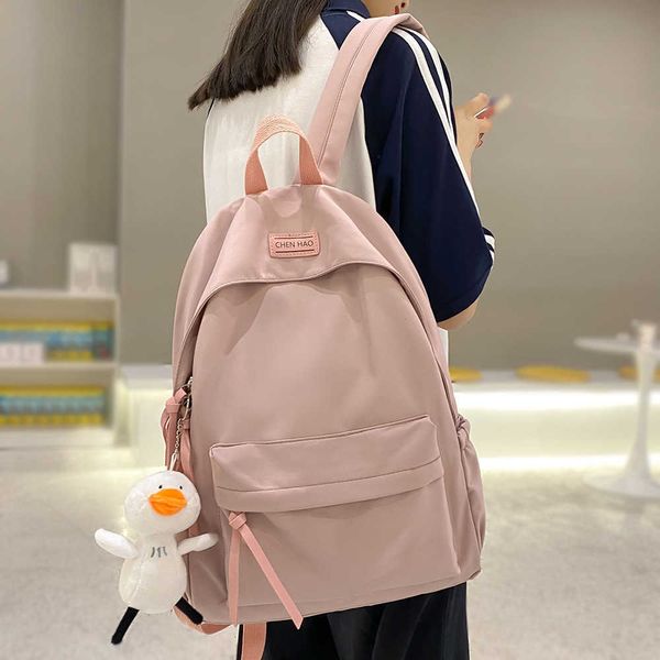 

cute girl pink school bags women cool college student backpack kawaii female fashion bag waterproof nylon ladies backpack trendy y0804