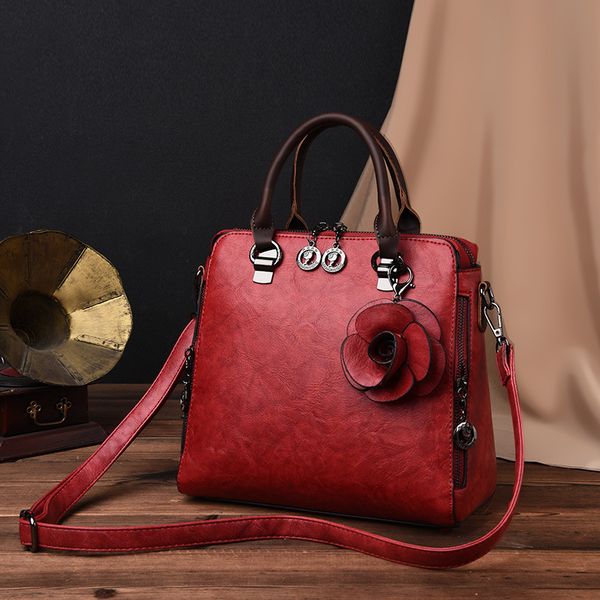 

soft leather women's bag korean fashion flower hand atmosphere four zipper princess of wales 2018