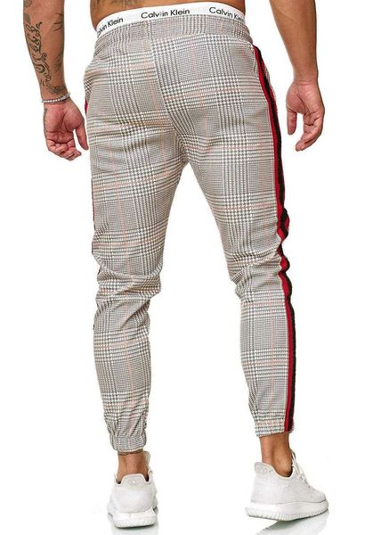 2021 Pantaloni a righe da uomo caldi Pantaloni a matita larghi casuali Slim Fit Plaid Side Stripe Skinny Jogger Pantaloni casual di alta qualità Y0811