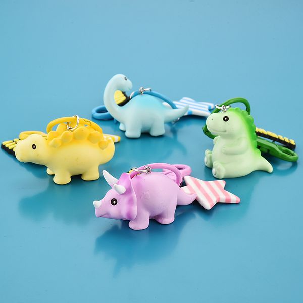 

2021 fashion keychain creative soft plastic cartoon tricera tyrannosaurus dinosaur pendant car key chain accessories small gift, Slivery;golden