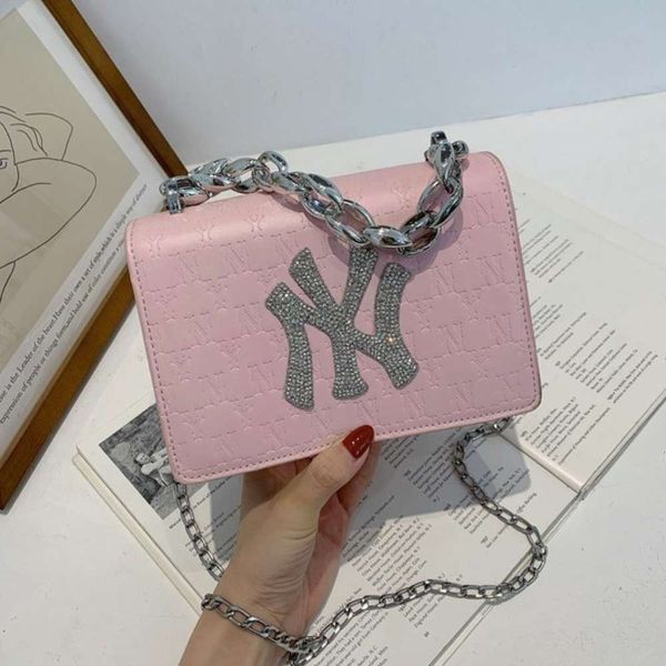 

designer storage bagbag spring tide female 2021 new small pure and fresh and leisure joker one shoulder hand his diamond small package