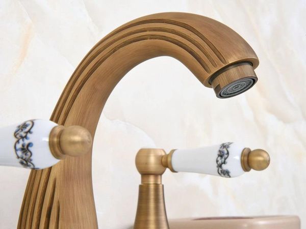 

bathroom sink faucets vintage retro antique brass deck mounted dual handles widespread 3 holes basin faucet mixer water taps man090