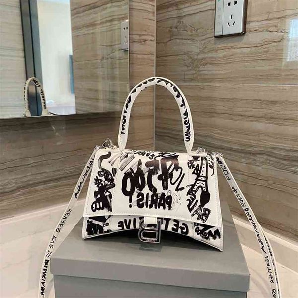 

handbag2021 trend graffiti bag hourglass popular personality women's single shoulder messenger handbag foreign stylegg bag