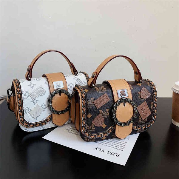 

2022 factory wholesale new bag women's fashion texture printed portable single net red wide shoulder belt messenger small square bag