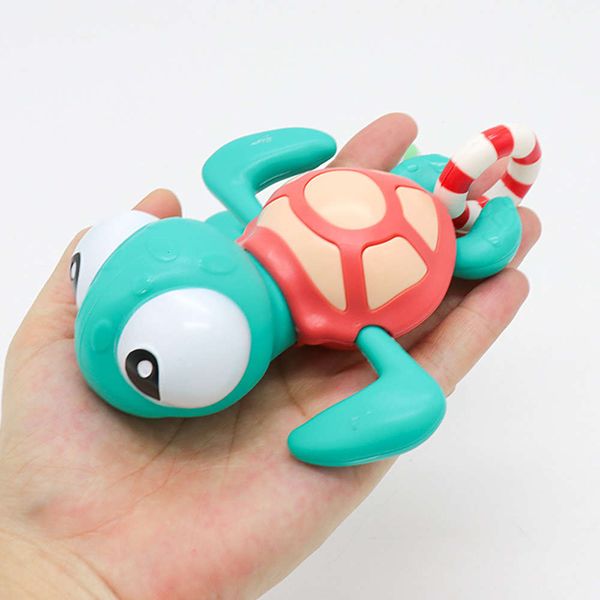 

children's bathroom shower playing with water beach toy string swimming turtle wind up