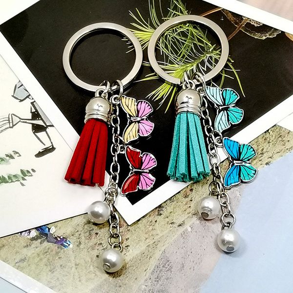

key chain 2021 tassel imitation pearl butterfly alloy oil dripping bag pendant, Silver