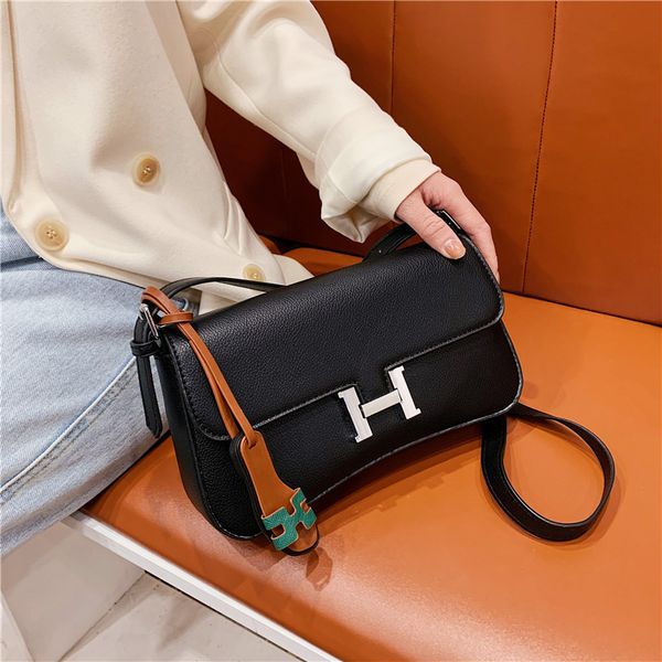 

french underarm female club fashion texture stewardess simple single shoulder messenger bag portable kangkang bag