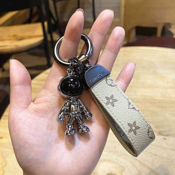 

high grade couple zinc alloy astronaut car key chain pendant cartoon old leather rope gift for men and women, Silver