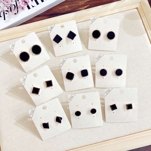 

butterfly version simple geometry black round irregular curved surface titanium earrings