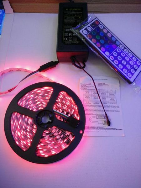 

arrive 5m / roll rgb smd led strip light 300 leds 44keys ir remote and 12v adapter combo controller eu/us plug kit strips