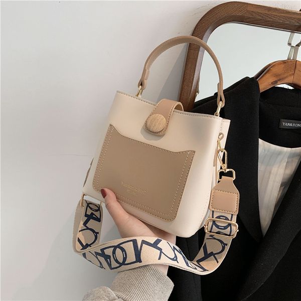 

hangbags trendy contrast color messenger bag 2021 simple temperament fashion portable women's spring large capacity bucket