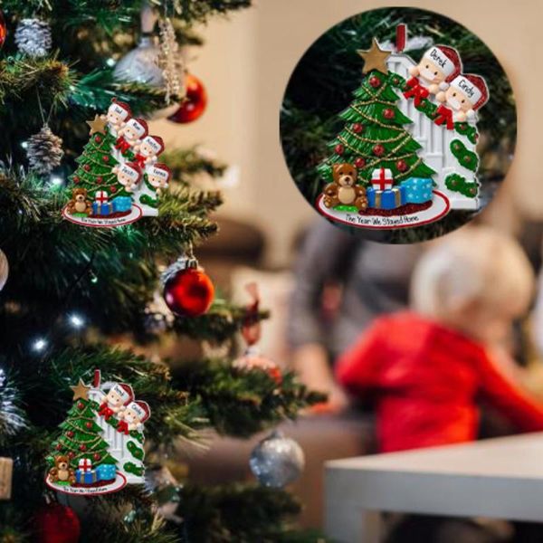 

christmas decorations tree ornaments xmas party decoration gift product personalized family members, wearing a face cover decorating