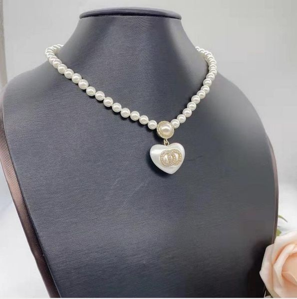 

2021 heart shaped middle rhinestone pearl brass necklace european and american fashion simple sweater chain women, Silver