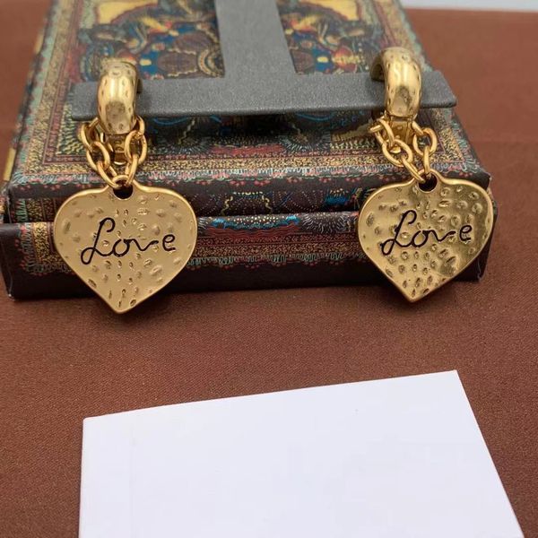 

2021 luxury designer jewelry love earclip two color chain peach earrings, Golden;silver