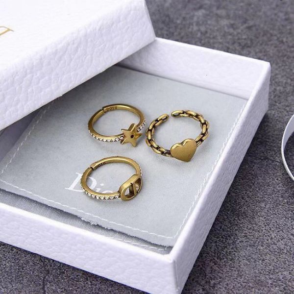 

luxury designer fashion dijia / dejia letter star heart-shaped three piece ring, Red;brown