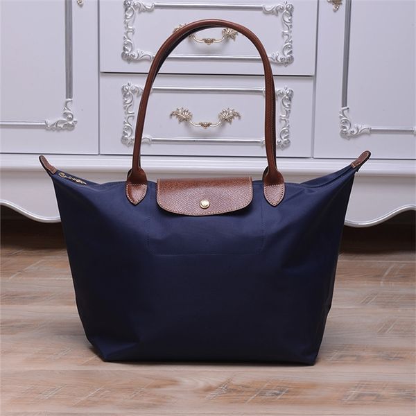 

french handbags dumpling bag women's handbag classic medium large long handle high-capacity longyu one shoulder portable tot mommy bags
